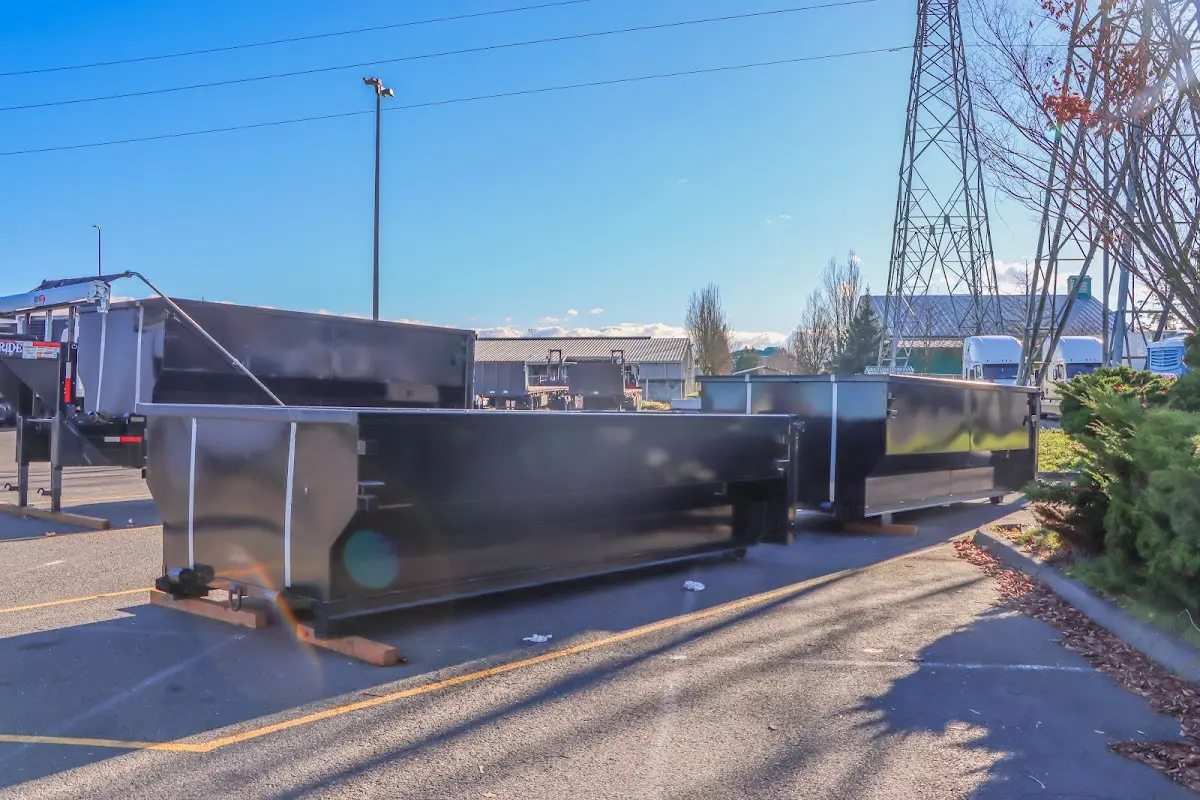 Roll-off dumpster ready for waste disposal at job site for Construction Dumpster Rental in Falmouth